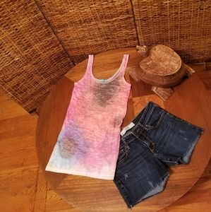 HAPPENING IN THE PRESENT TANK TOP